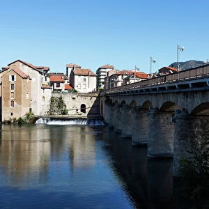 Millau / France - old town and historic bridge crossing Tarn River