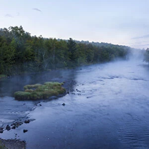 Morning mist rising from East Branch of Penobscot River, Matagamon Wilderness Camps, International Appalachian Trail, Maine, USA