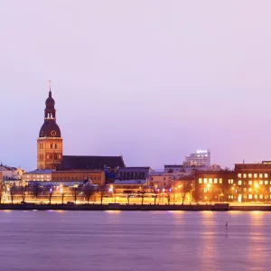 Old Riga skyline at dusk and Daugava river. Riga, Latvia