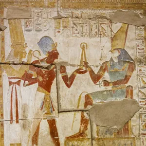 Polychromatic hieroglyphic showing The god Horus and Pharaoh Seti I at Abydos