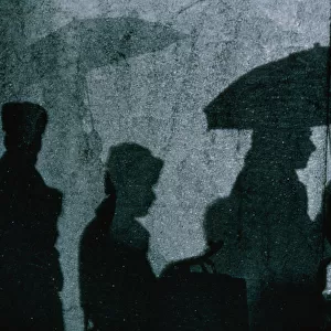 Shadows of People and Umbrella