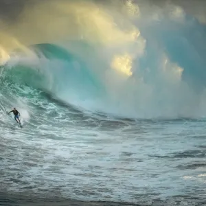 Surfer on a big wave at Jaws