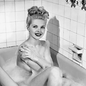 Woman having bubble bath