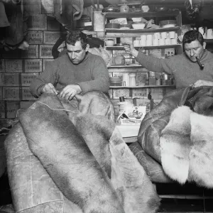 Edgar Evans and Tom Crean mending sleeping bags. May 16th 1911