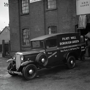 A delivery van from Platt Mill, Borough Green, Kent is loaded up with sacks of flour