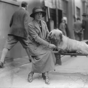 Dog show at Holland Park. Lady Marcia Miles with her Skye Terrier. 16 April 1925