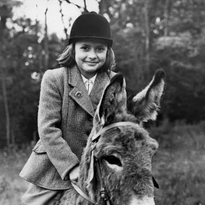 Donkey - lightweight jockey Geraldine Hinson (9) of Jarvis Brook, Sussex, will be