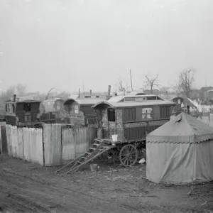 Gypsy caravans and tents on Belvedere Marshes, Kent