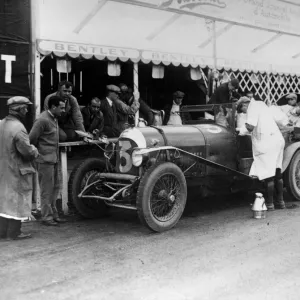 Le Mans 1927 Old Number 7 3 litre Bentley at the pits being refilled by Dr J D Benjafield