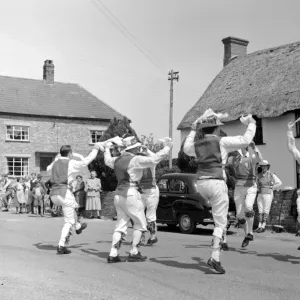 Morris Dancing in the street in Dorset, England, UK 1960 s