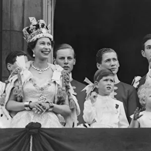 Queen Elizabeth II gestures as her husband Duke of Edinburgh Prince Phillip and children