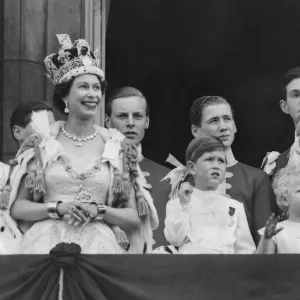 Queen Elizabeth II gestures as her husband Duke of Edinburgh Prince Phillip and children