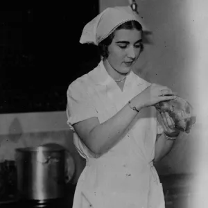 A Royal cook. Princess Ingrid of Sweden, photographed while working at the Cooking