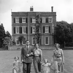 Taking a morning stroll in the garden of Ayot House, their home at Ayot St Lawrence