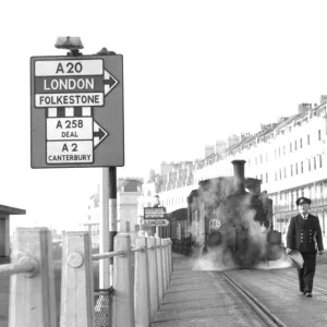 The last train in England to have a man walk in front waving a red flag, through