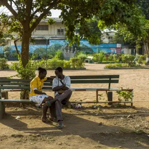 A couple speaks in a park in the centre of Bangui, Central African Republic, on February 13