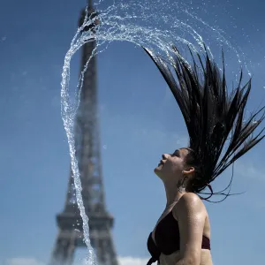 France-Eiffel Tower-woman-water-hair