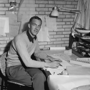 A black and white photograph of Jorn Utzon in his home A black and white photograph of Jorn Utzon in his home