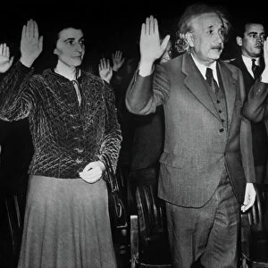 Albert Einstein pledging allegiance to become an American citizen with his secretary Helen Dukas and his step daughter Margot, 1940 (b/w photo)