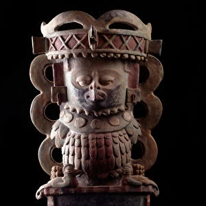 Anthropomorphic incense vase, decorated with a figure wearing a mask of the Quetzal bird