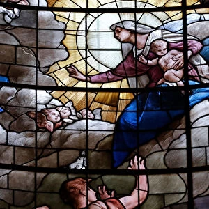 The Assumption of the Virgin Mary into Heaven. Stained glass window