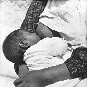 Baby nursing (Conchita with her mother Luz Jimenez), Mexico City, 1926 (b / w photo)
