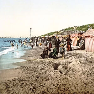 The beach at Trouville in France, 1890-1900 (chromolitho)