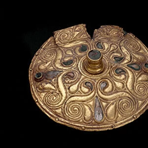 Bronze disc covered with a gold leaf inlaid with corals and emals. From Auvers-sur-Oise, 4th century BC