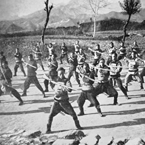 Chinese Boxer soldiers drilling, 1900 (b / w photo)