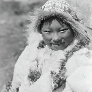 Eskimo child identified as Uyowutcha, probably from Nunivak Island, Alaska, c. 1929 (b/w photo)