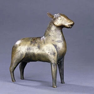 A Fatimid brass figure of a roe deer in naturalistic form, 11th-12th century (brass)