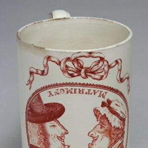 Humorous mug decorated with invertible heads of a man and woman, c. 1780 (creamware)