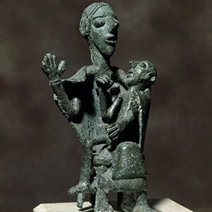 Mother Goddess with her son, 8th-7th century BC (bronze statuette)