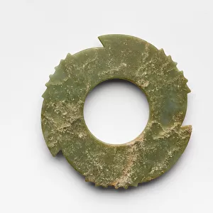 Notched disk, c. 1600-c. 1050 BC (jade, nephrite)