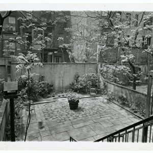 back patio with bird house, New York, USA, c. 1905-40 (gelatin silver photo)