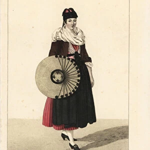 Peasant woman of Baden, near Basel, Switzerland, 19th century. Her straw hat is decorated with silk pompons, and her toque with bows. Handcoloured copperplate engraving by Georges Jacques Gatine after an illustration by Louis Marie Lante