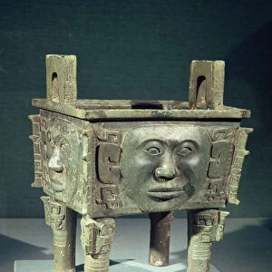Rectangular ting vessel with human faces, from Ning-hsiang, Hunan Province