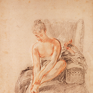 Semi-nude woman seated on a chaise longue, holding her foot (sanguine and black chalk