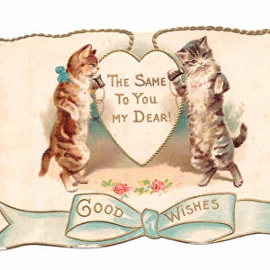 A Victorian greeting card of two cats talking on antique telephones, c