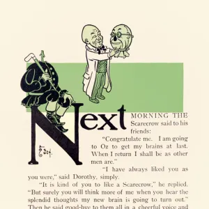 The Wizard giving the Scarecrow new brains, from The Wonderful Wizard of Oz'