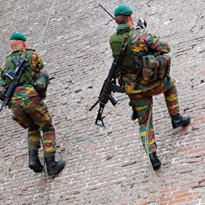 Belgian paratroopers climbing a wall during Operation Storm Tide