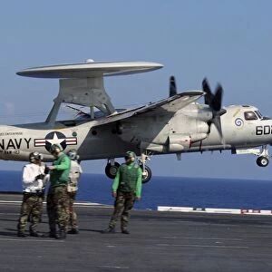 An E-2C Hawkeye launches from aboard USS Enterprise