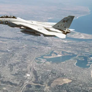 An F-14A Tomcat cruises above San Diego, California