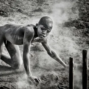 Collecting dung in a mundari cattle camp-II