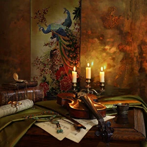 Still life with violin and candles