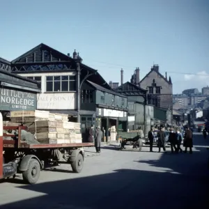 Castlefolds wholesale fruit and vegetable market, Broad Street showing (left) Uttley and Norledge Ltd. fruit and vegetable merchants, 1958