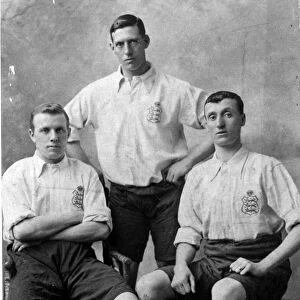 Three footballers in England shirts. The player on the right is Albert Sturgess who also played for Sheffield United, c. 1912