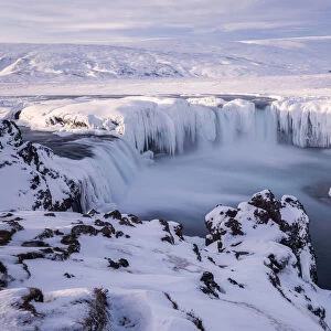Godafoss waterfall frozen during winter, Bardardalur District, North-Central Iceland
