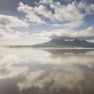 Isle of Rum at sunset viewed from Eigg, Scotland, April 2013