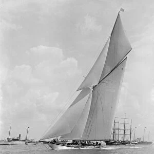 The 179 ton cutter White Heather sailing close-hauled, 1924. Creator: Kirk & Sons of Cowes